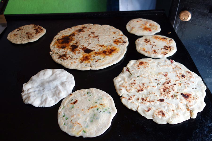Pupusas on a grill