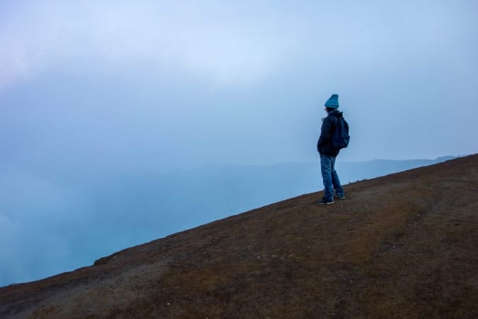 Ben starring into the smoke of Mount Ijen