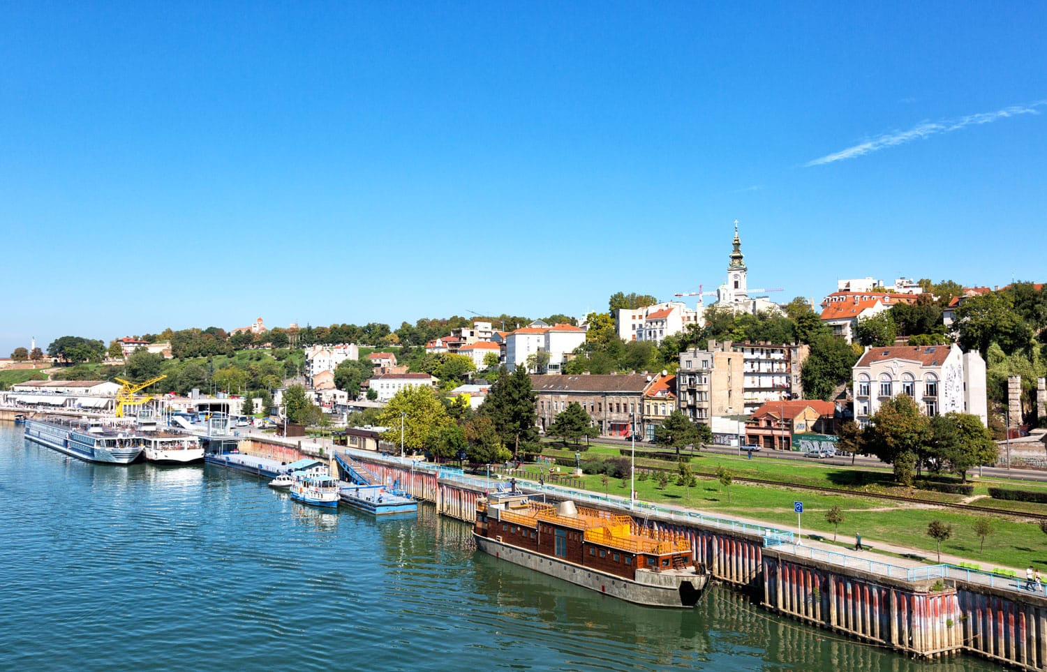 Belgrade from river Sava with riverboats on a sunny day, Serbia