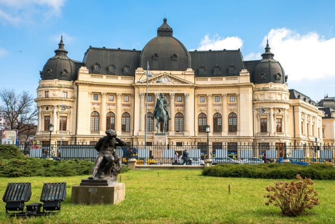 Central University Library of Bucharest with the Statue of King Carol
