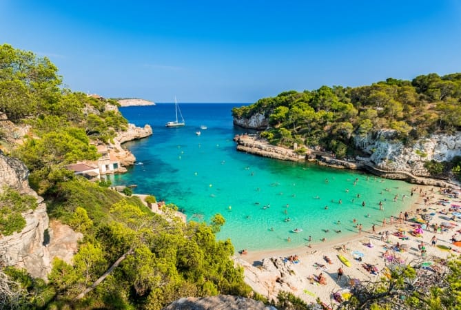 Beautiful beach Cala Llombards at Majorca island with tropic turquoise sea water, Mediterranean Sea Spain.