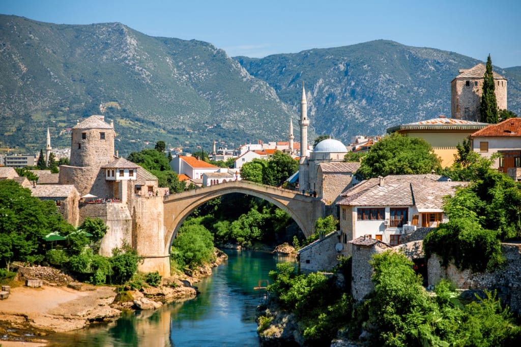 Beautiful view on Mostar city with old bridge and ancient buildings on Neretva river in Bosnia and Herzegovina