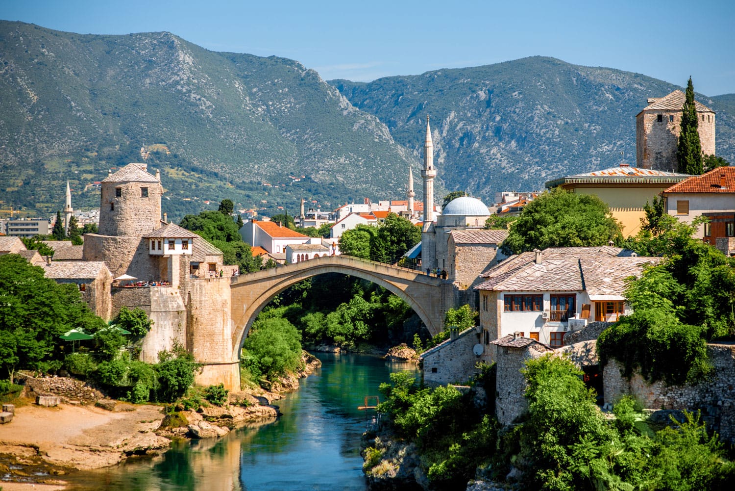 Beautiful view on Mostar city with old bridge and ancient buildings on Neretva river in Bosnia and Herzegovina