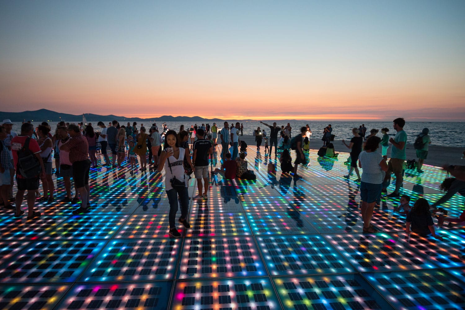 Solar panels lit up at sunset in Zadar, Croatia