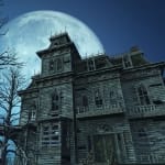 A spooky old haunted house on a moonlit night