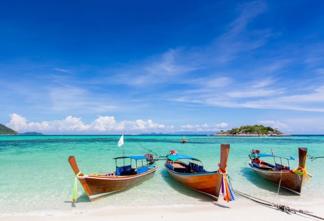 long-tailed boat on Bundhaya beach Koh LIPE Thailand