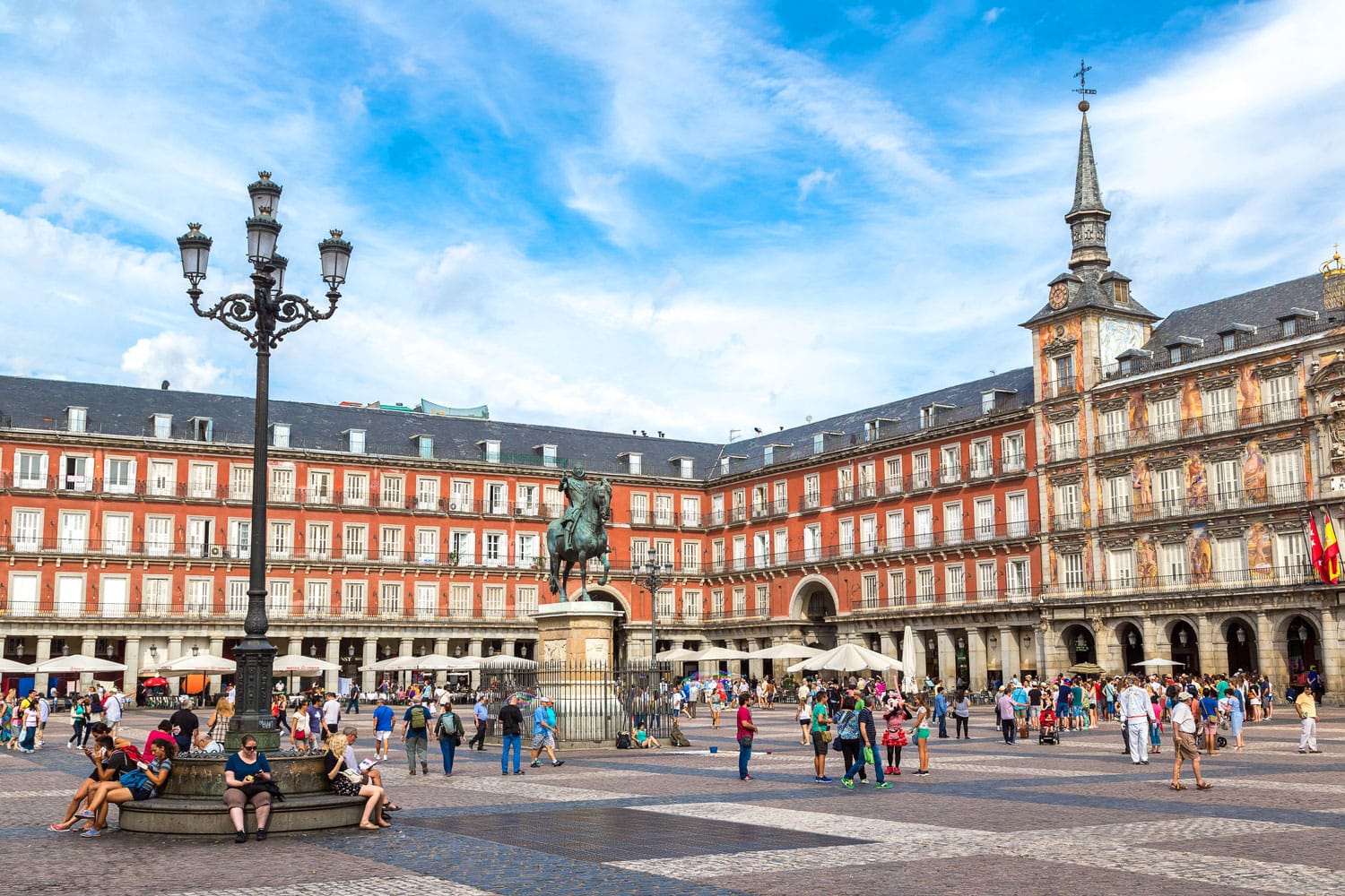 Statue of Philip III at Mayor plaza in Madrid in a beautiful summer day on in Madrid, Spain