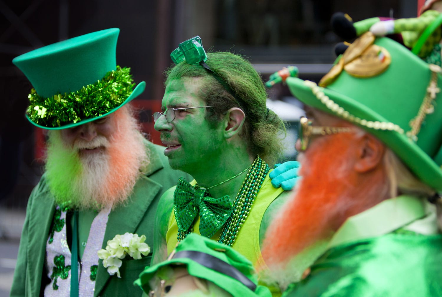 hree men in funny leprechaun costumes at the St. Patrick's Day Parade