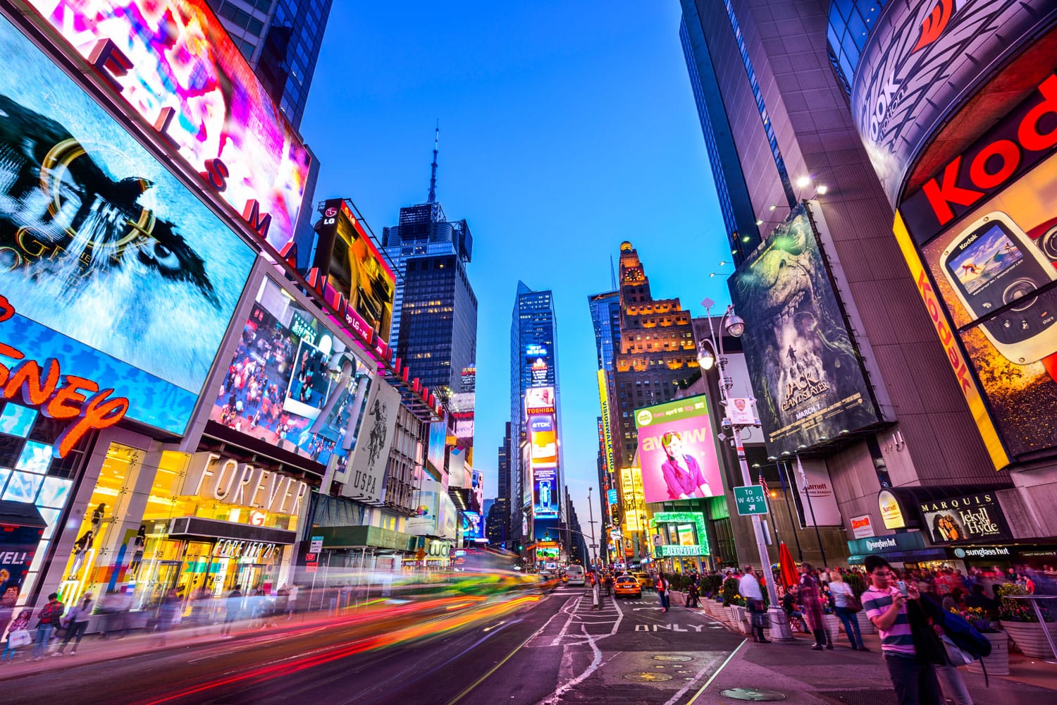 Times Square crowds and traffic at night in New York City