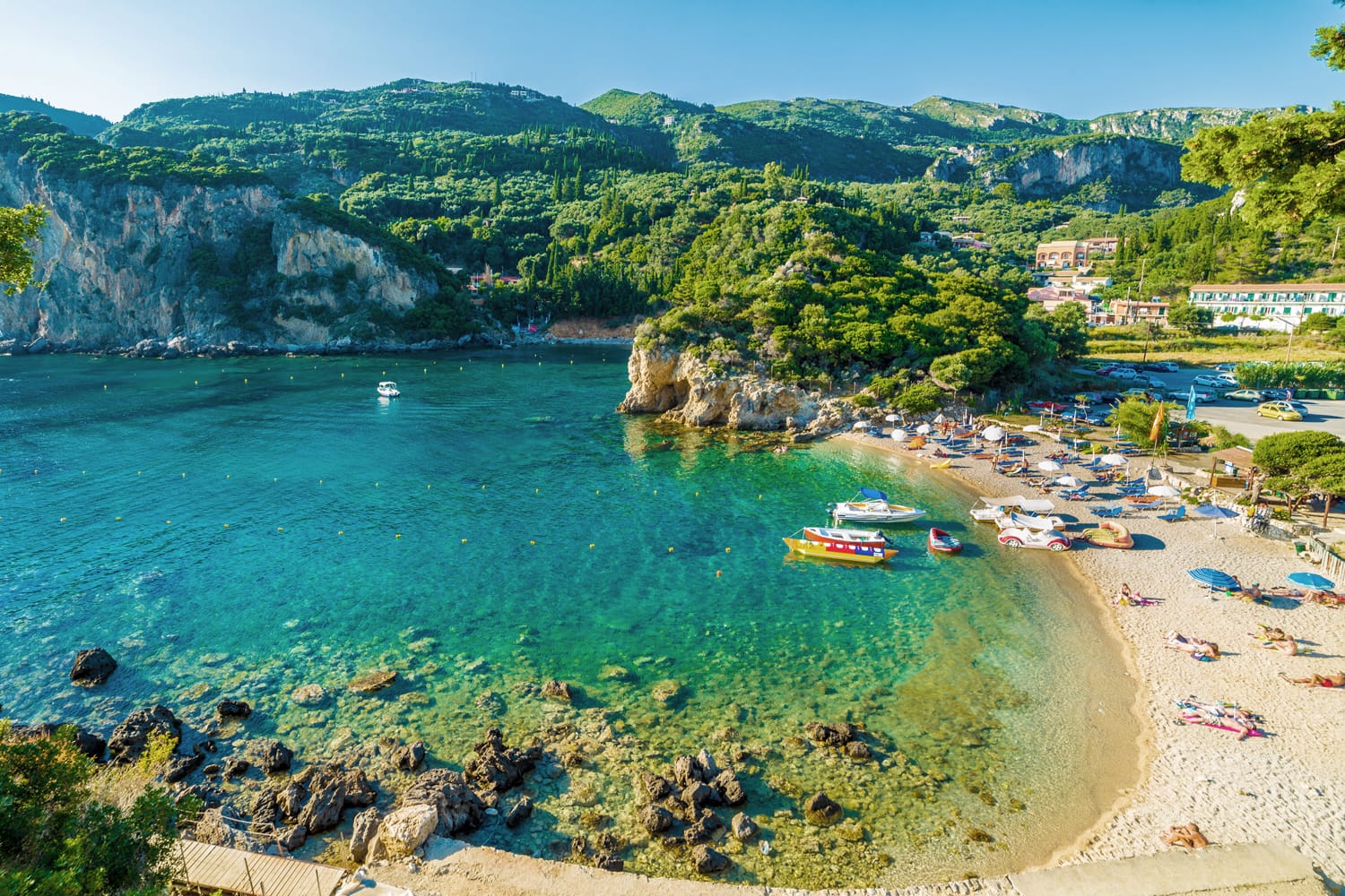 Beautiful beach and boat in Paleokastritsa, Corfu island, Greece