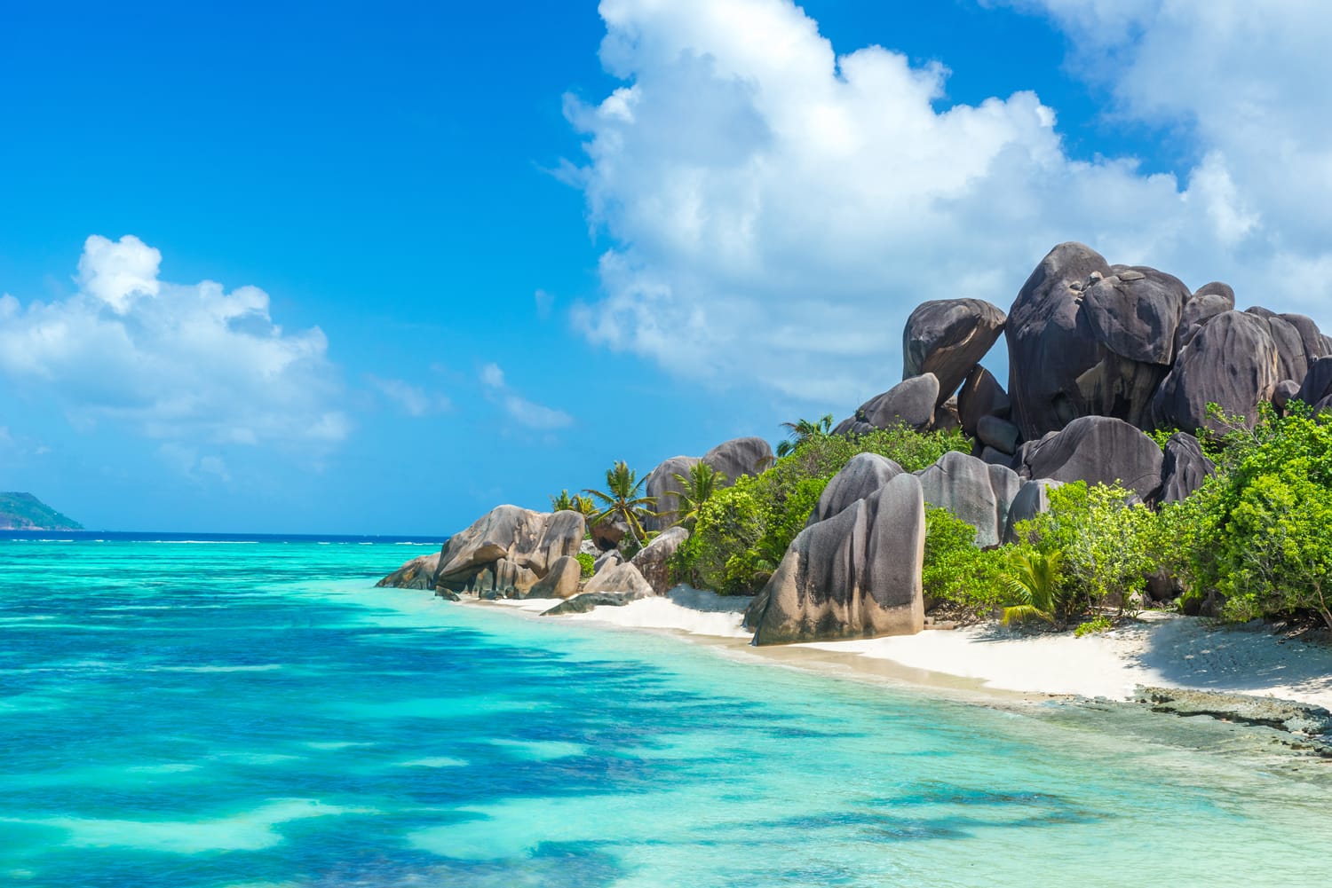 Anse Source d'Argent - granite rocks at beautiful beach on tropical island La Digue in Seychelles