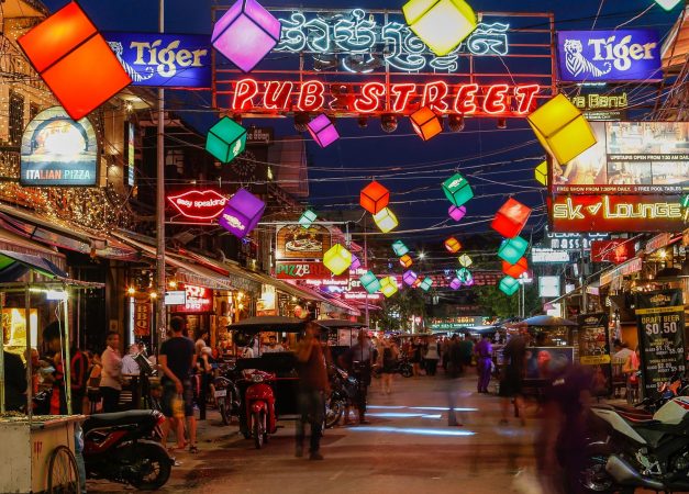 Bars, restaurants and lights along Pub Street in Siem Reap Cambodia at night