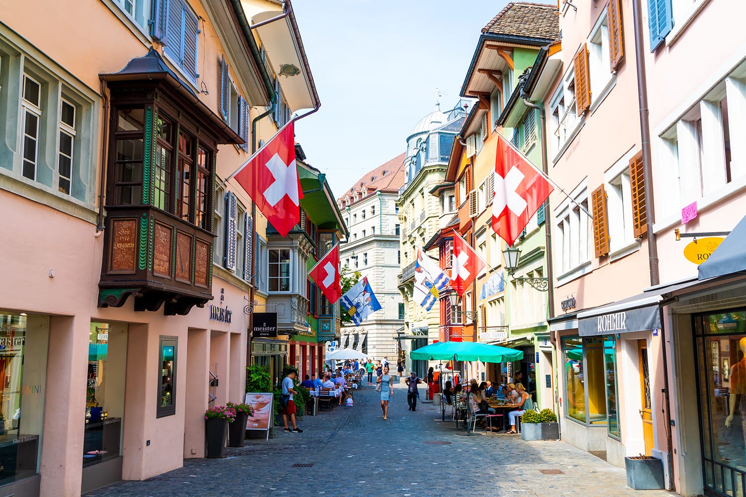 Augustinergasse pedestrian Street with colorful buildings with cafe and restaurants in the old city center of Zurich City in Switzerland