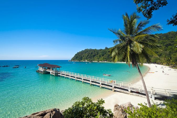 The beautiful island of Pulan Perhentian with its turquoise water and white sand beaches offers amazing snorkelling for tourists.