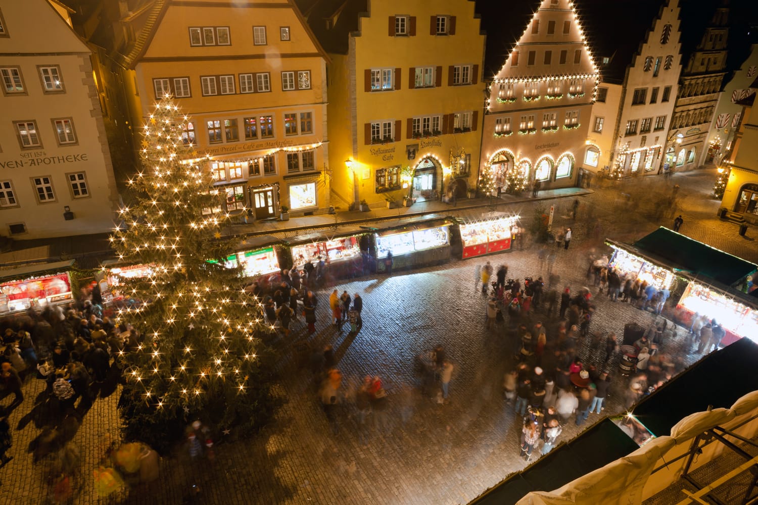 Christmas Markets in central square by night in Rothenburg ob der Tauber, Germany