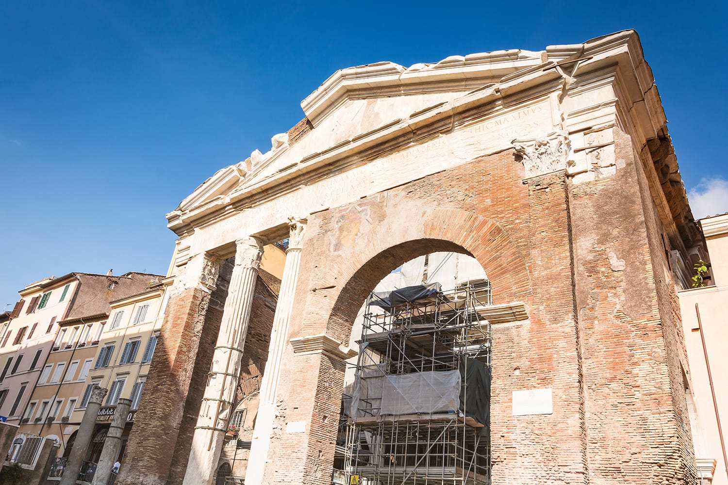 Frontal view of Portico d'Ottavia. Ancient structure. The colonnaded walks of the portico enclosed the temples of Jupiter Stator and Juno. Rome, Italy