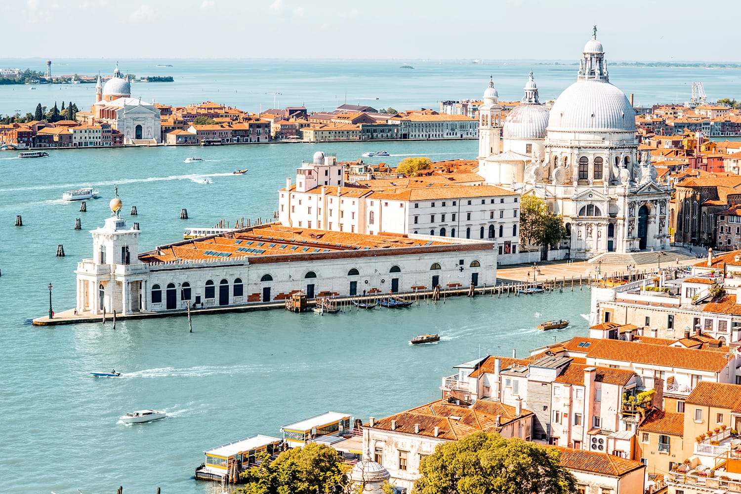 Aerial cityscape view on Venice old town with Santa Maria basilica at the sunny day