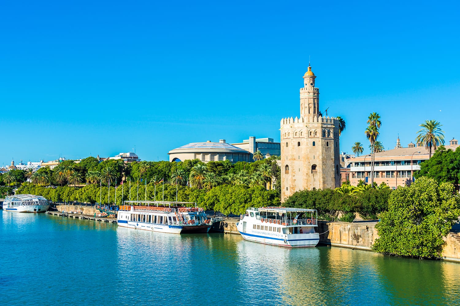 The Torre del Oro in Seville is an albarrana tower located on the left bank of the Guadalquivir River. It houses the Naval Museum of Seville, Spain