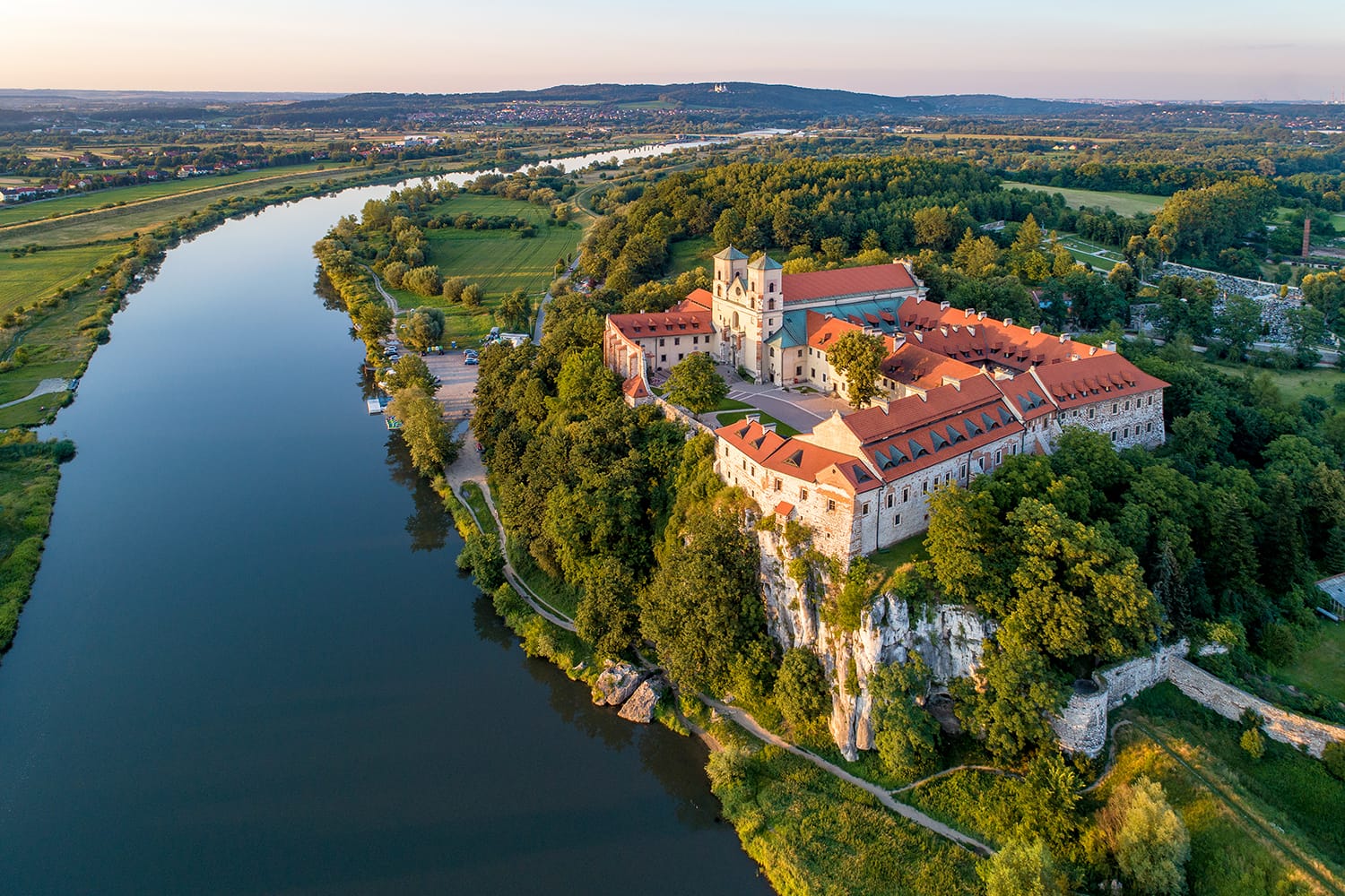 Tyniec near Krakow, Poland. Benedictine abbey, monastery and church on the rocky cliff and Vistula river.