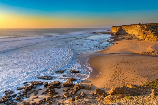 View of the Praia de Ribeira de Ilhas in Ericeira village near Lisbon. Ericeira, Portugal.