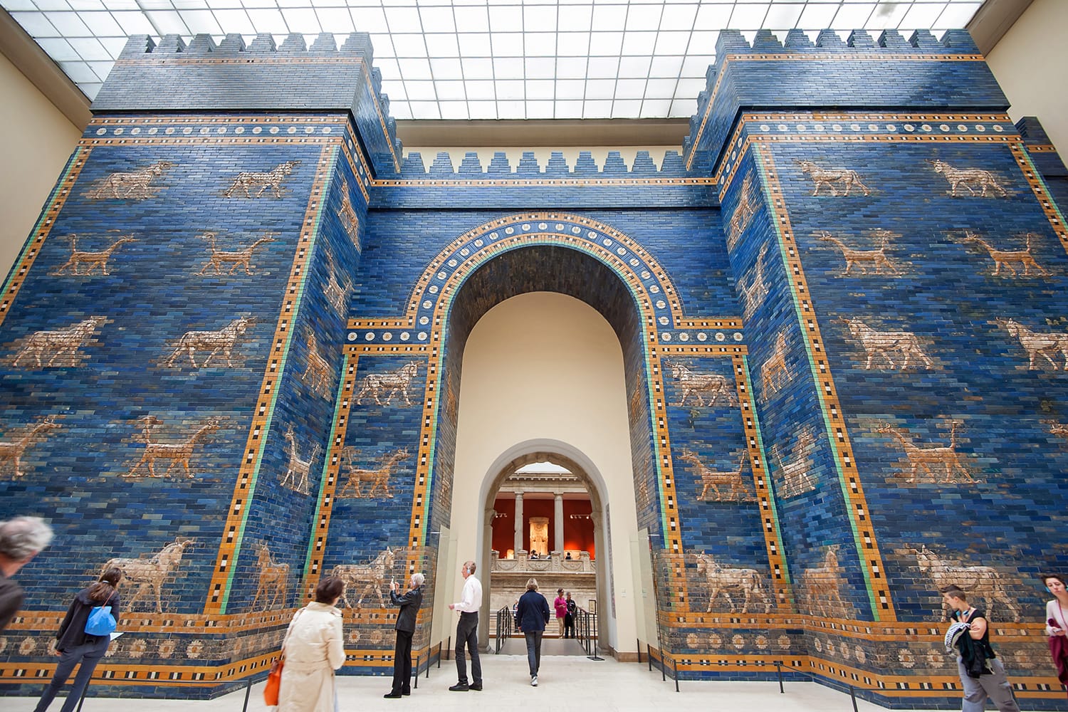 Tourists in front of Babylonian city wall at the Pergamon museum in Berlin, Germany