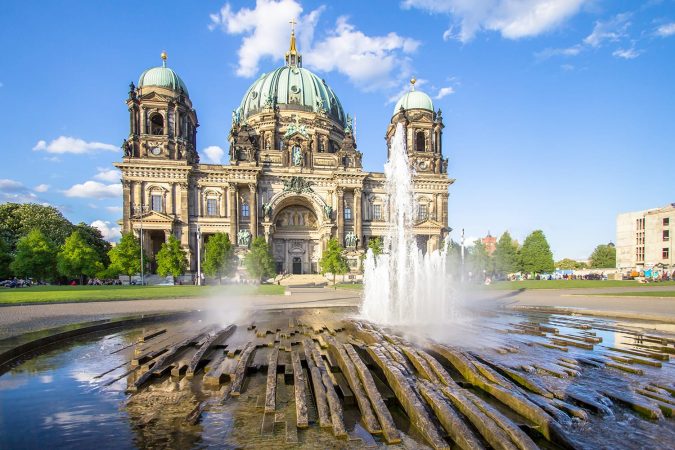 View of the Berliner Dom (Berlin Cathedral) with a fountain in the foreground in Berlin, Germany