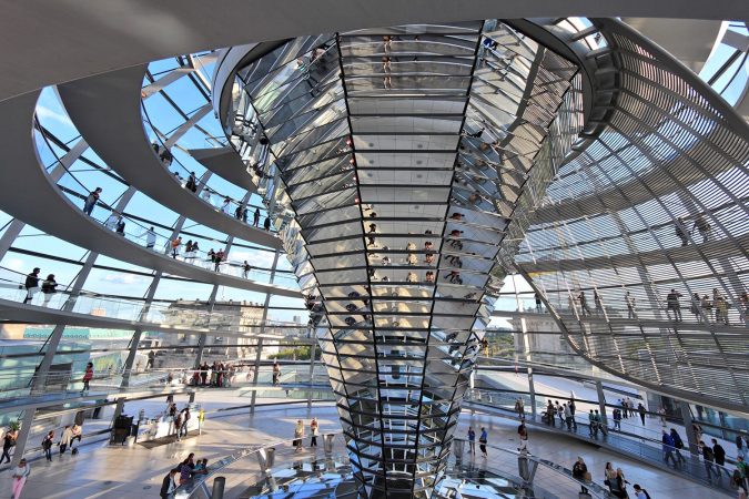 People visiting Reichstag building dome in Berlin