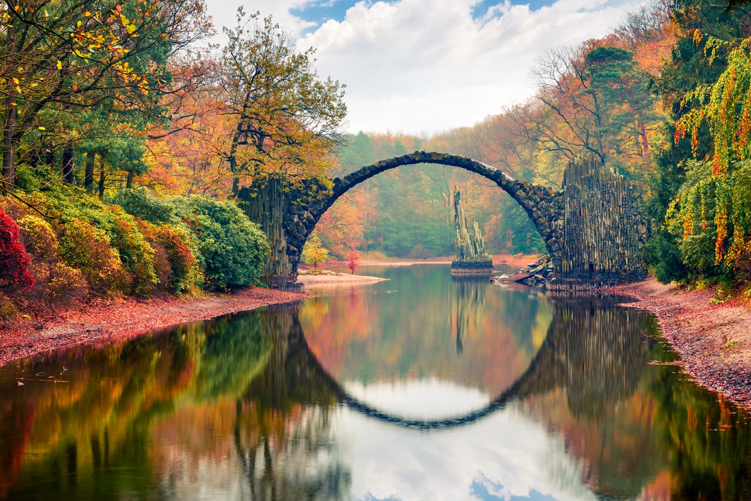 Rakotz Bridge (Rakotzbrucke, Devil's Bridge). Unbelievable morning scene of Azalea and Rhododendron Park Kromlau, Germany, Europe