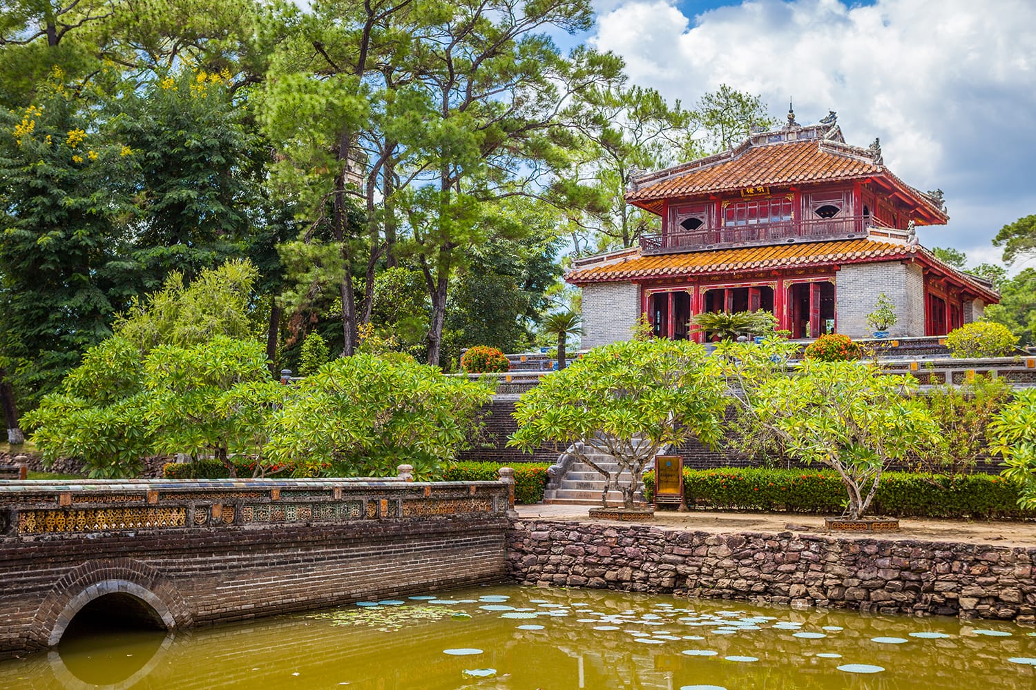 Minh Lau pavilion and Trung Dao bridge at Minh Mang Emperor Tomb in Hue, Vietnam