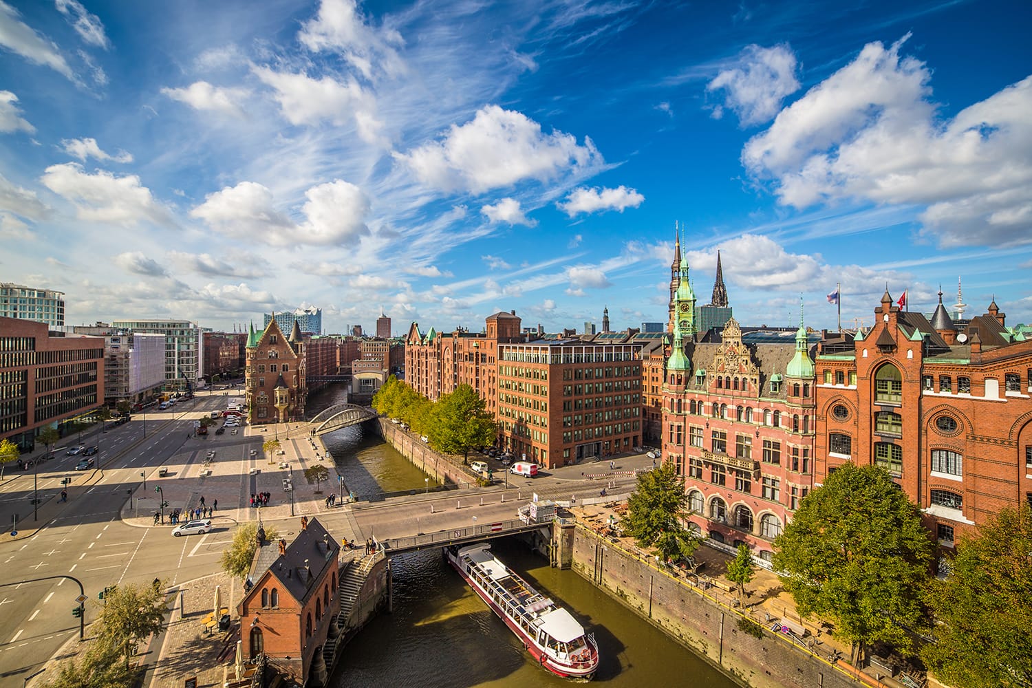 Famous Speicherstadt warehouse district with blue sky and clouds in Hamburg, Germany