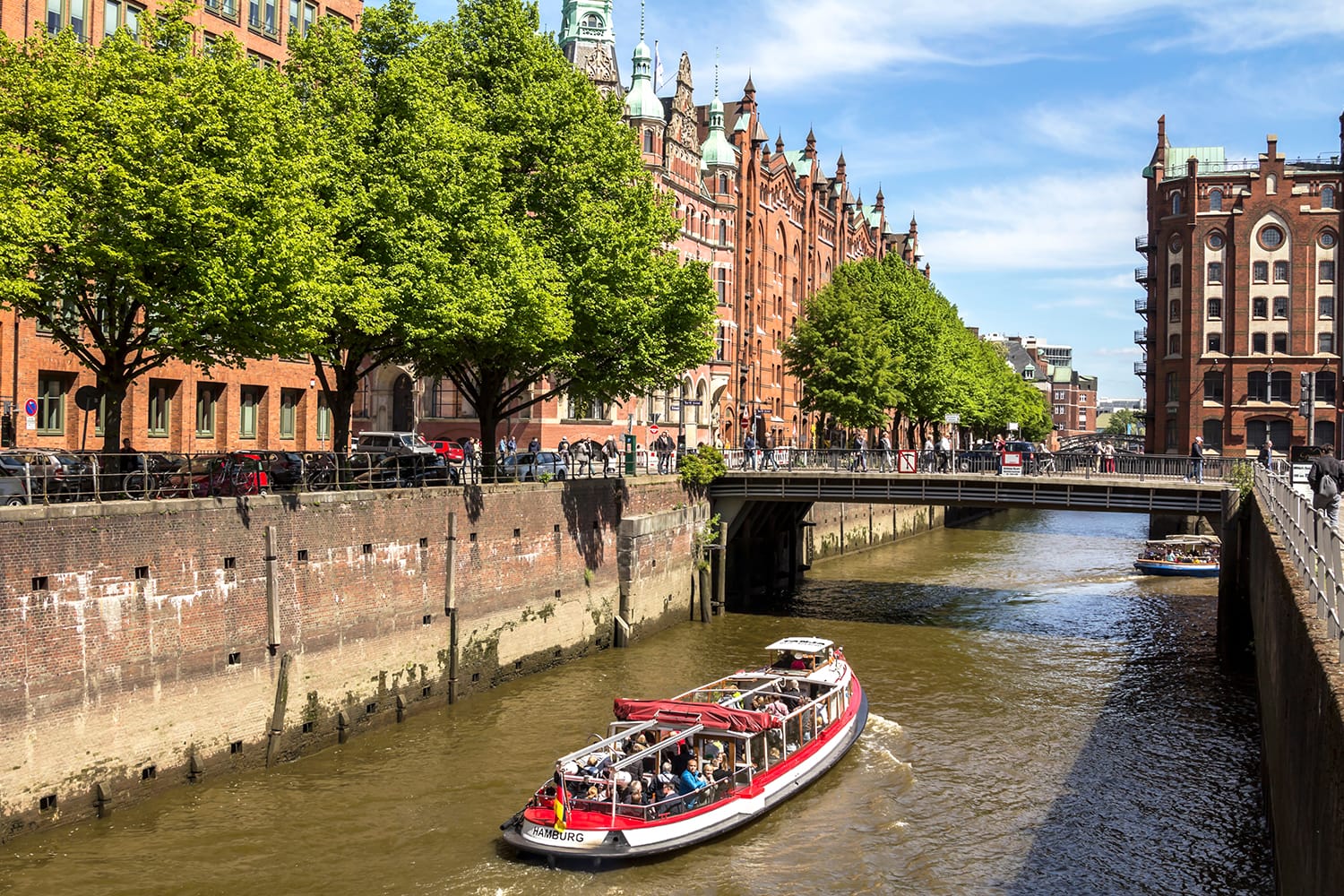 Famous Speicherstadt warehouse district with blue sky and clouds in Hamburg, Germany