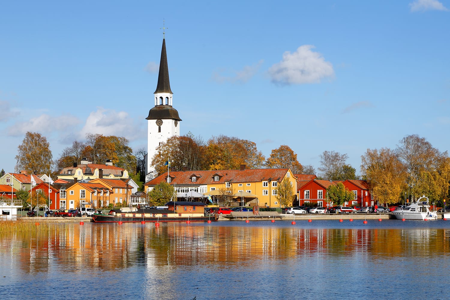 The view of the harbor in Mariefred with the church in the background as seen from the Gripsholm Castle