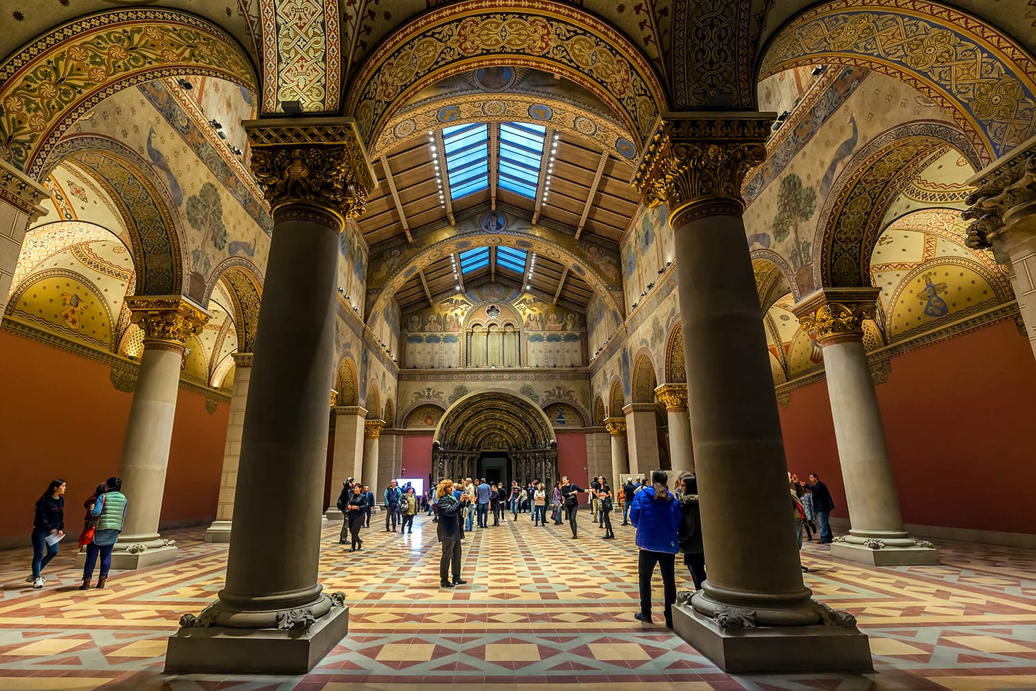 Unidentified people watch the refurbished Romanian hall of the Budapest Fine Arts Museum