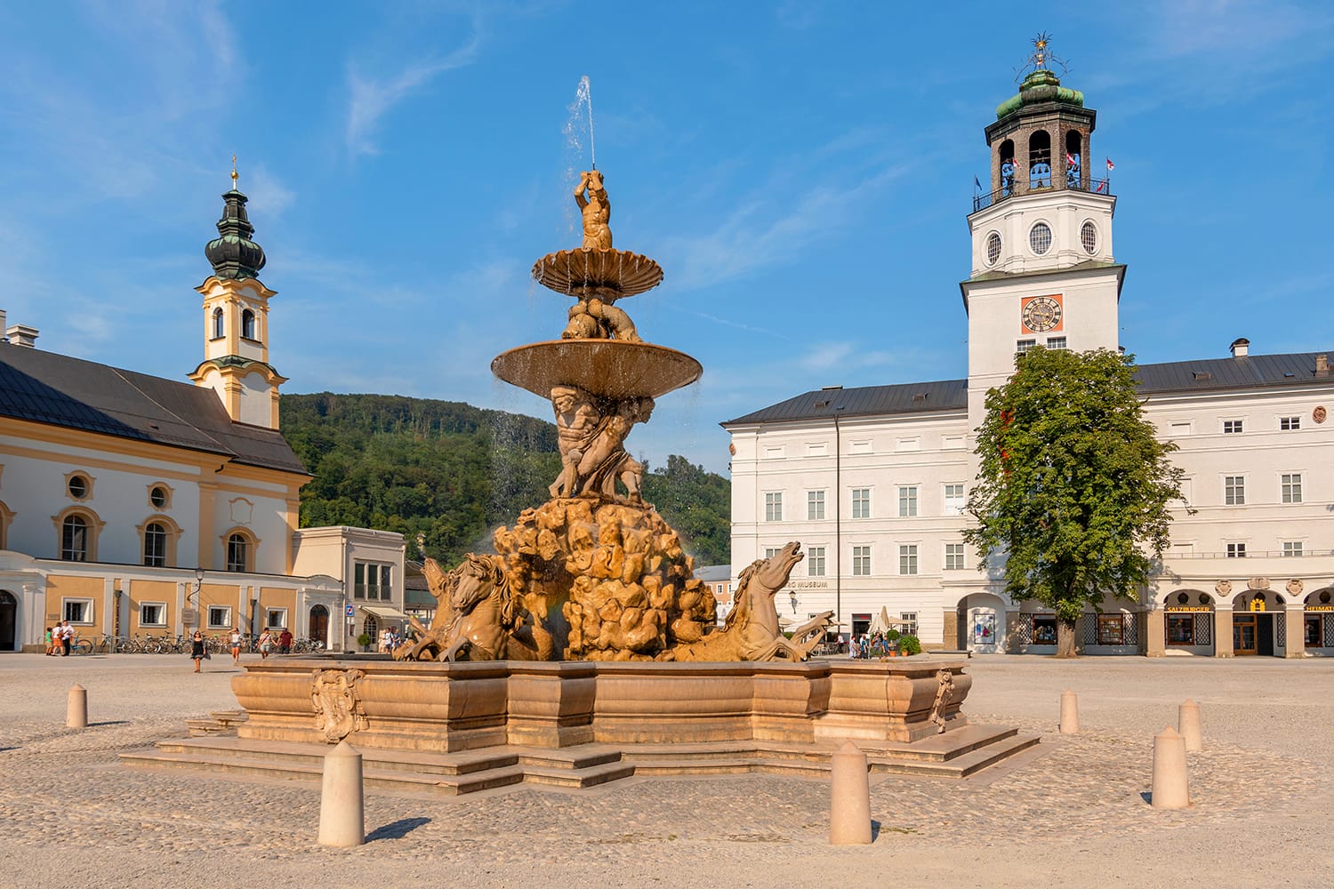 The fountain of Residence square in the old town of Salzburg Austria
