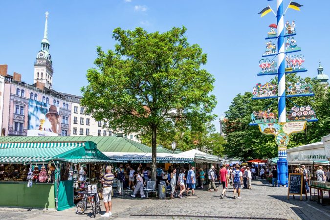 View of Viktualienmarkt a sunny day. It is a daily food market and a square in the center of Munich near Marienplatz