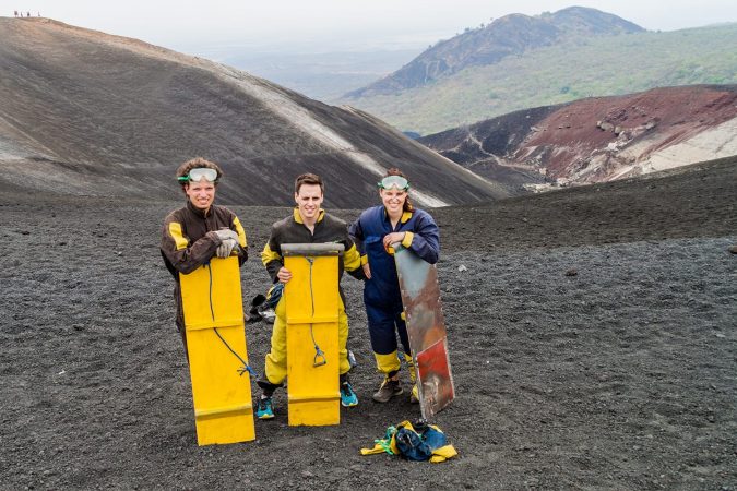 Tourists are ready for volcano boarding from Cerro Negro volcano, Nicaragua