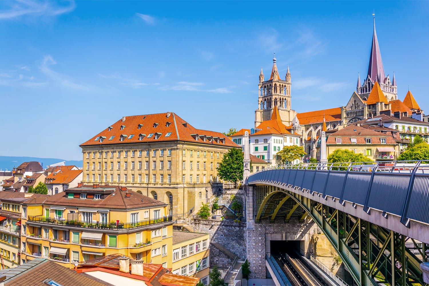 Gothic cathedral behind Charles Bessieres bridge in Lausanne, Switzerland