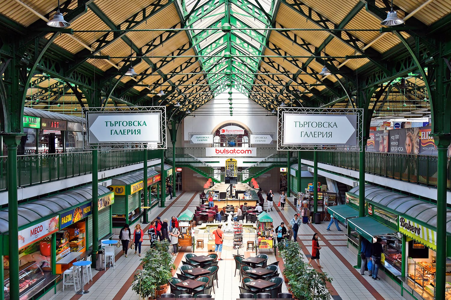 Unidentified people in public Central Market building with cafes and shops in Sofia, Bulgaria