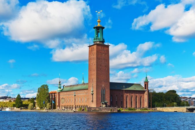 Scenic summer view of the City Hall castle in the Old Town (Gamla Stan) in Stockholm, Sweden