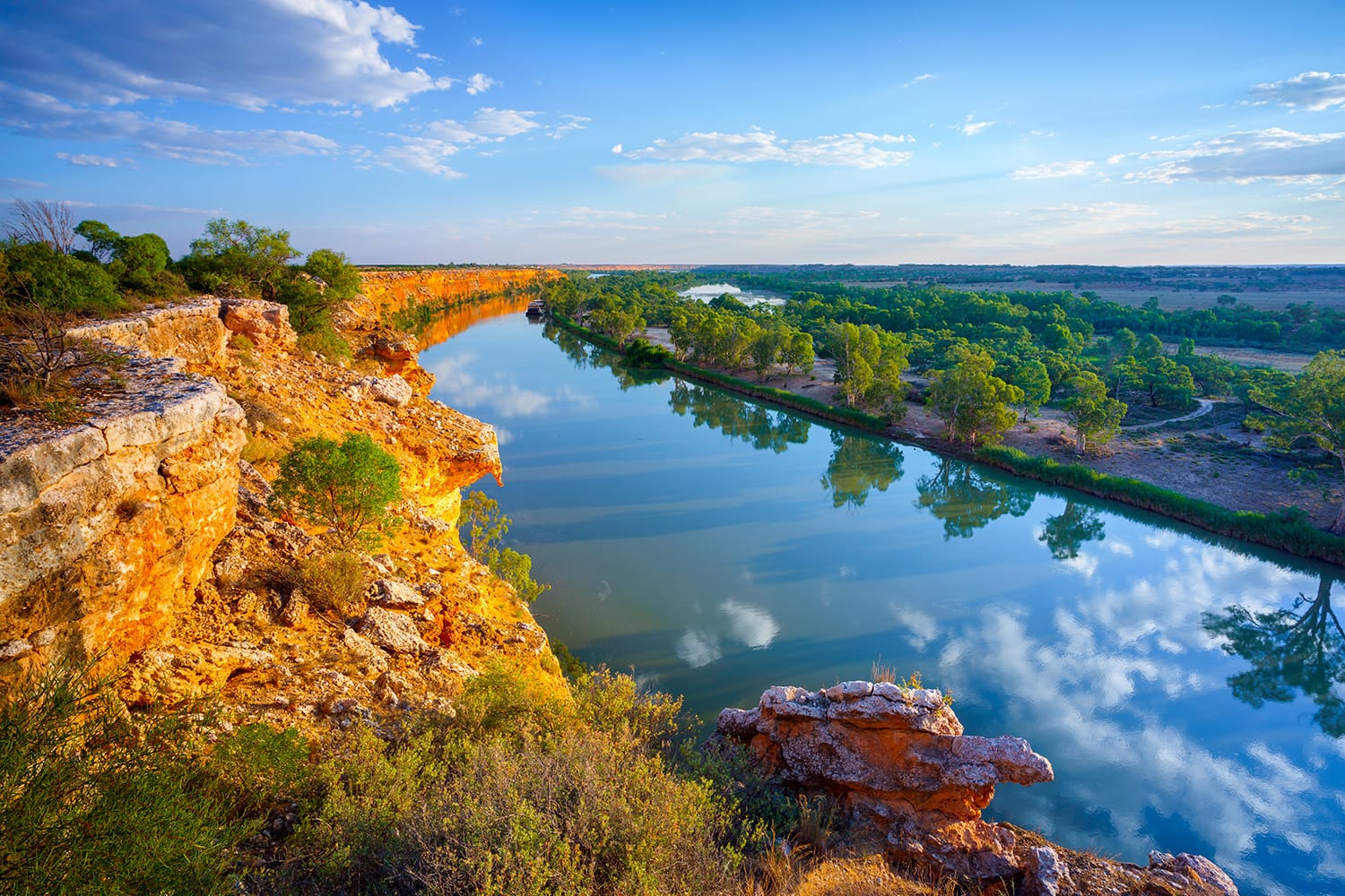 Golden glow on cliffs on the Murray River, South Australia