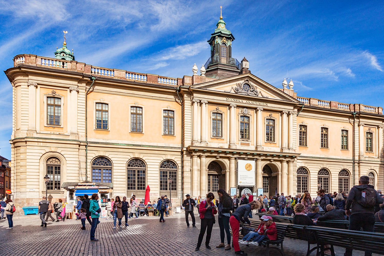 Tourists outside the Nobel Museum in Stockholm, Sweden