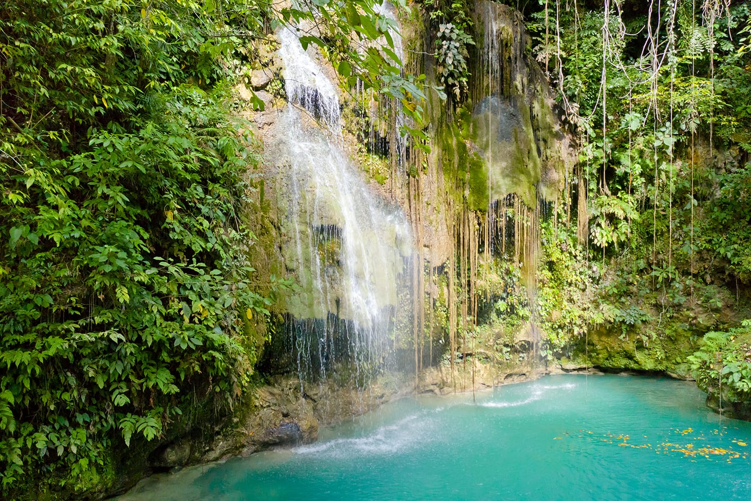 Cambais waterfalls in a mountain gorge in the tropical jungle, Philippines, Cebu