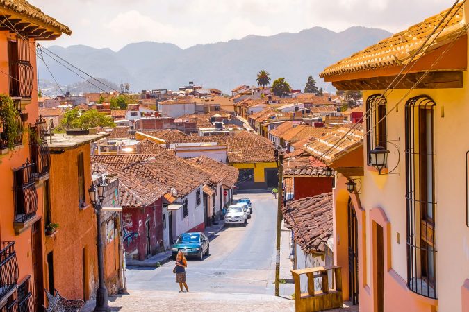 Street view and sidewalk in the historical centre of San Cristobal de las Casas, Mexico