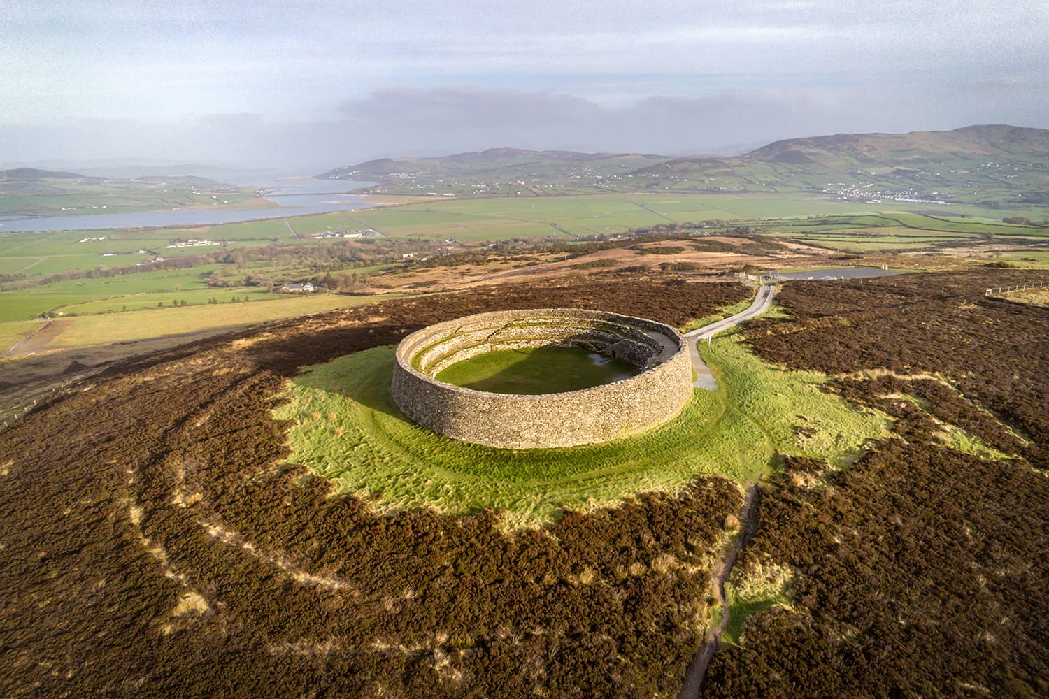 This is Grianan Of Aileach. It is a stone ring fort in Donegal Ireland just out side of the City of Derry