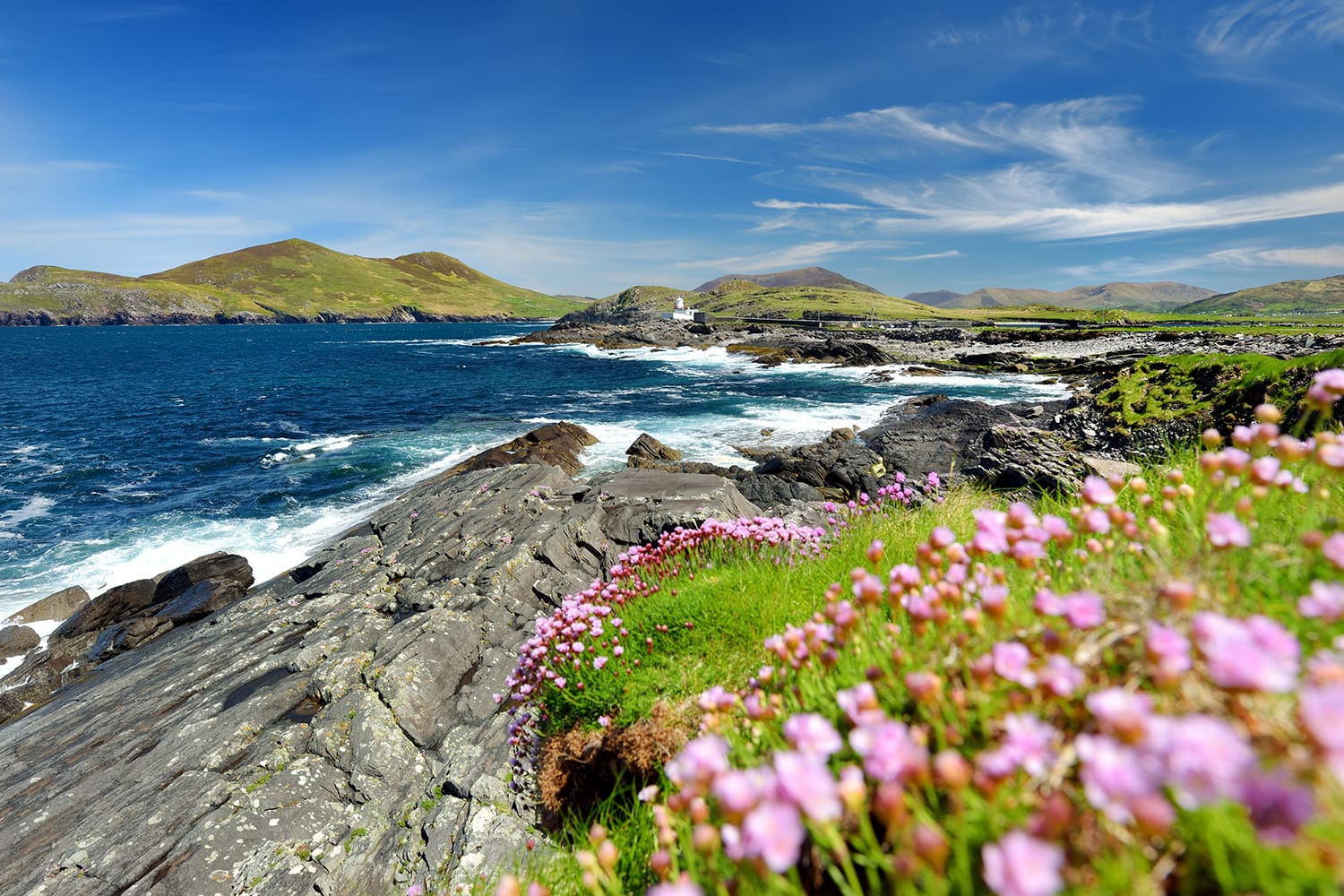 Beautiful view of Valentia Island Lighthouse at Cromwell Point. Locations worth visiting on the Wild Atlantic Way. Scenic Irish countyside on sunny summer day, County Kerry, Ireland.