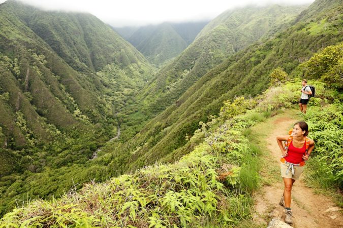 People hiking the Waihee ridge trail, Maui, Hawaii, USA