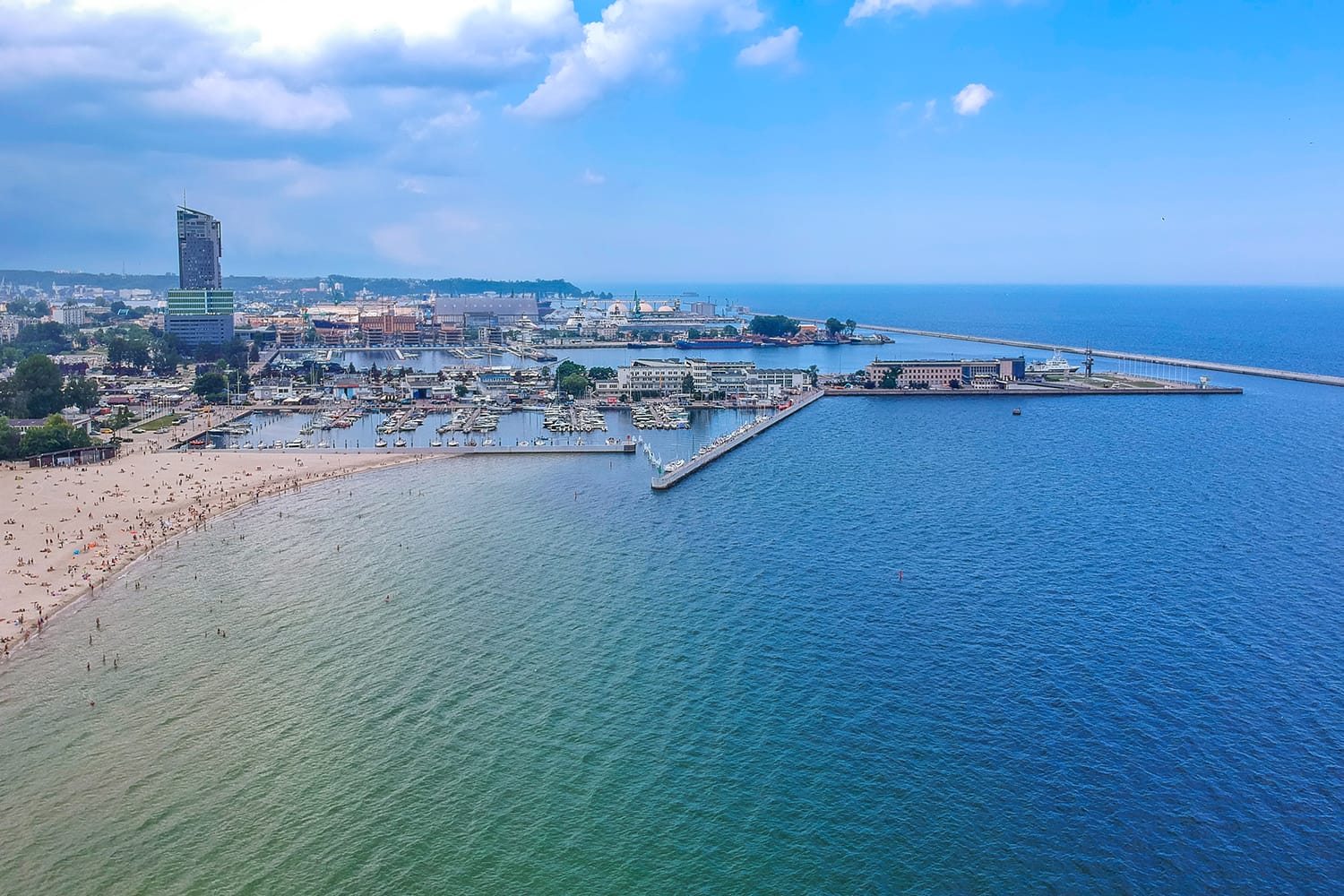 People on the beach at Baltic Sea in Gdynia, Poland