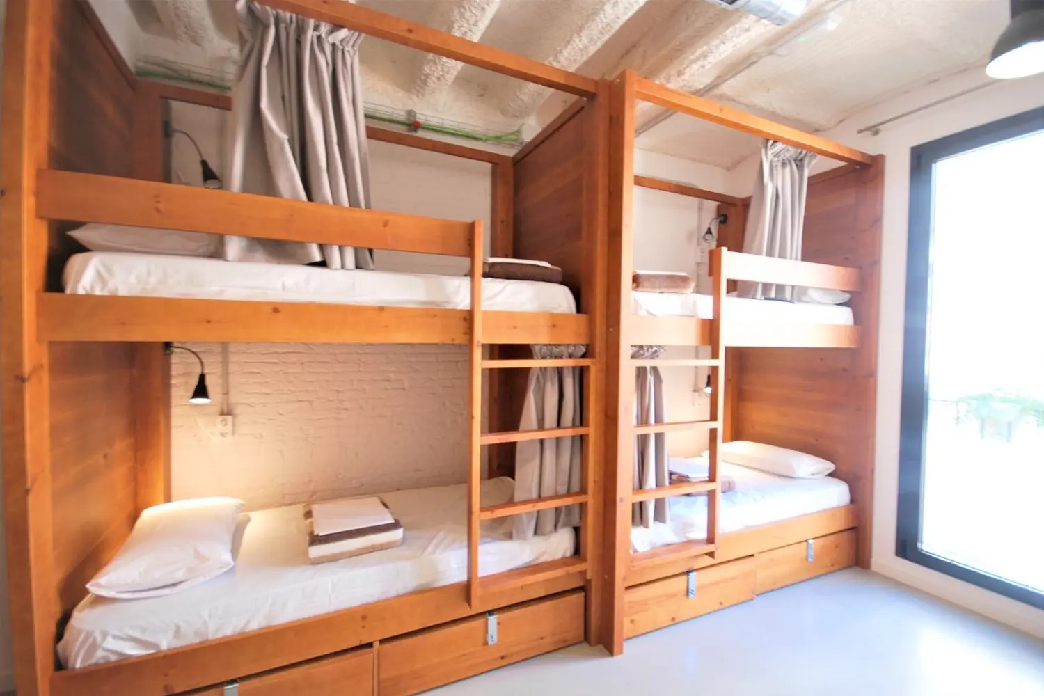 Dorm room at Ten To Go Hostel in Barcelona