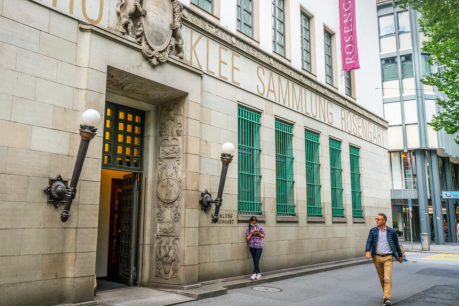 Entrance street view of the Sammlung Rosengart museum with people in Lucerne Switzerland