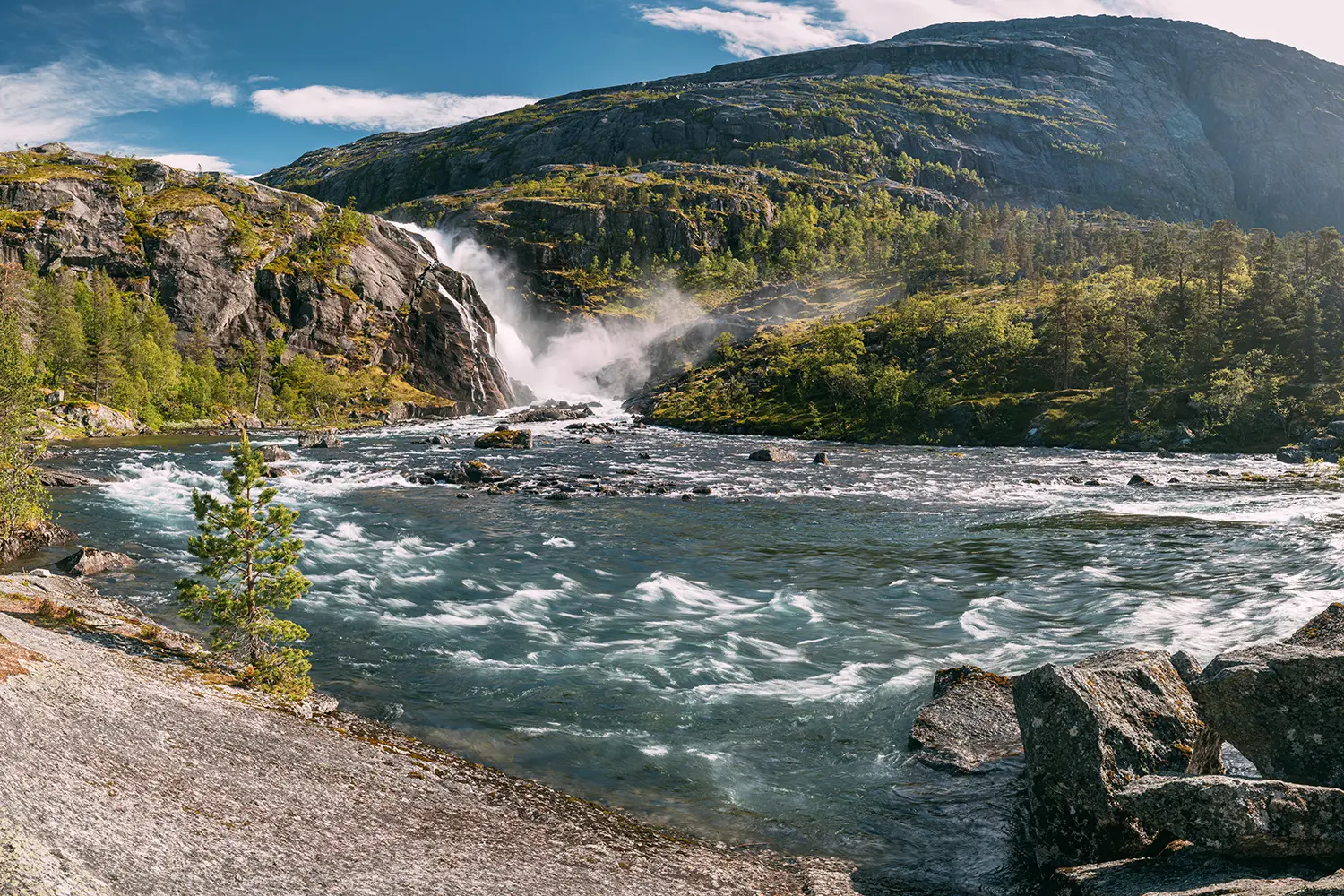 Kinsarvik, Hordaland, Norway. Waterfall Nykkjesoyfossen In Hardangervidda Mountain Plateau